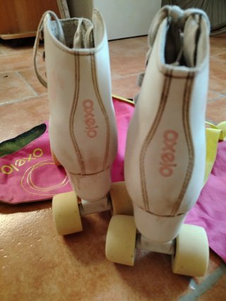 Patines Oxelo 4 ruedas + Bolsa (talla 35-22,5 cm)