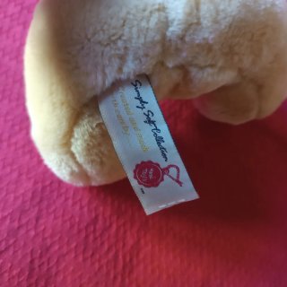 Peluche cane beige con collare