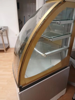 Vitrina refrigerada dorada y blanca