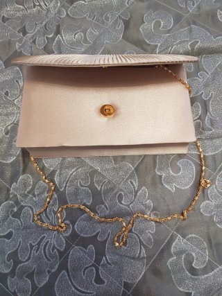 Bolso de fiesta dorado plisado