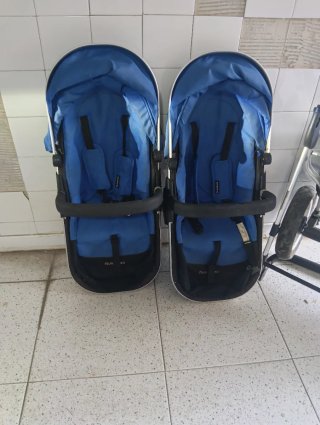 Silla gemelar Firstwheels (incluye accesorios)