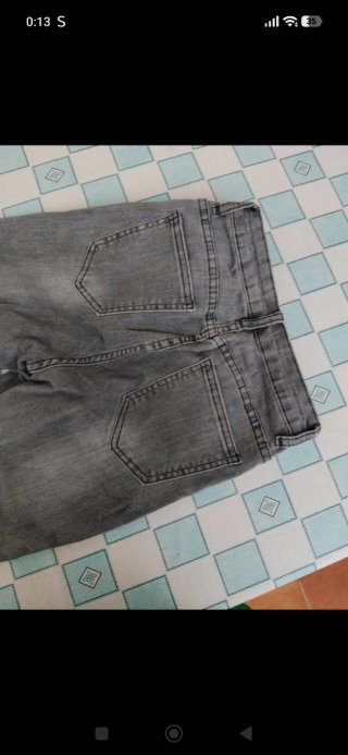 Vaqueros grises rotos talla 36