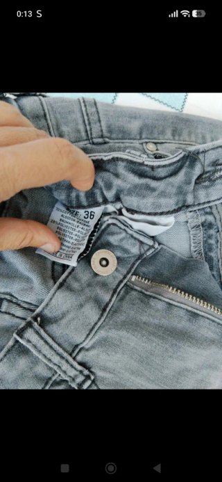 Vaqueros grises rotos talla 36
