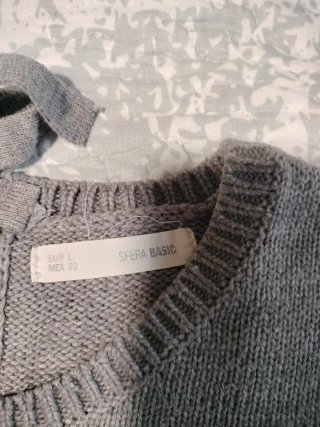 Jersey gris con lazada en espalda