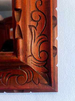 Espejo de madera tallada