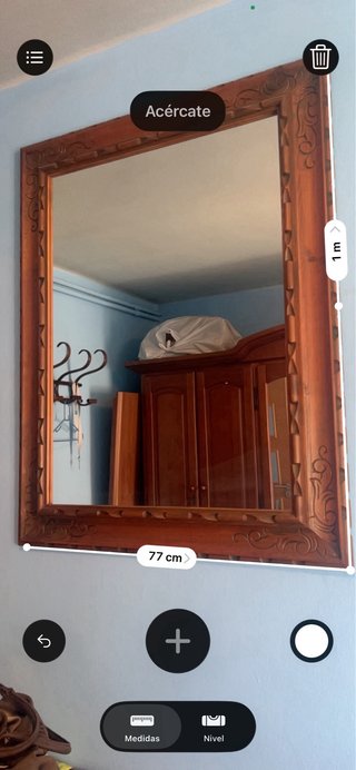 Espejo de madera tallada