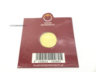 moneda oro 24k con 0