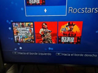 PS4 Slim 1TB Negra + Juegos  dos mandos y cargador