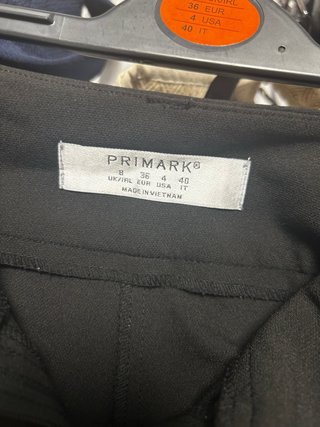 Pantaloni neri da donna con cintura