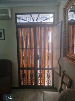 Puerta forja y cristal