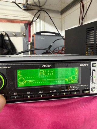 Radio CD Clarion DX2558RMP con cargador 12 discos