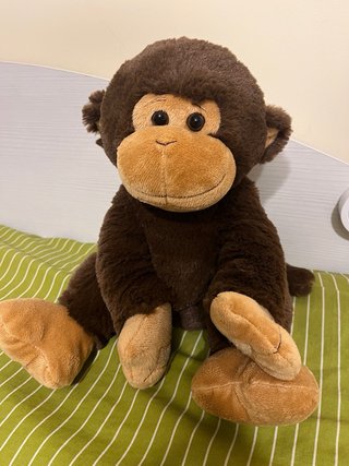 Mono de peluche con velcro en manos