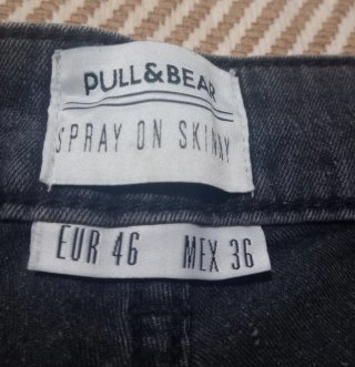Pantalón pitillo gris oscuro elástico