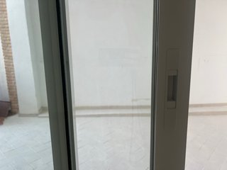 Ventana corredera con persiana