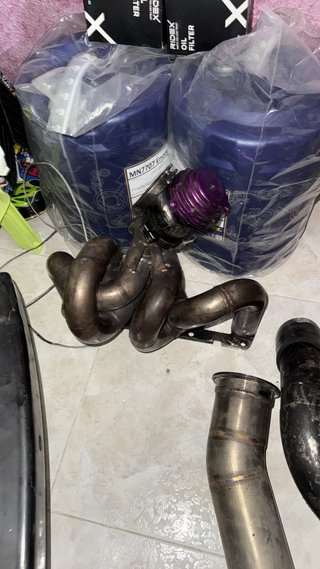 Sistema de escape y intercooler valbula  de descar