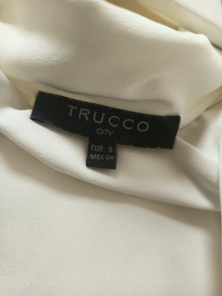 Bonita blusa blanca sin mangas
