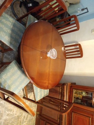 Mesa redonda de comedor de madera y 5 sillas