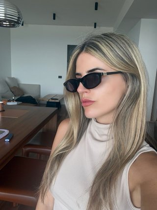 Occhiali da sole Miu Miu neri e oro