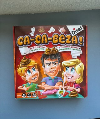 Juego de mesa Caca-Cabeza
