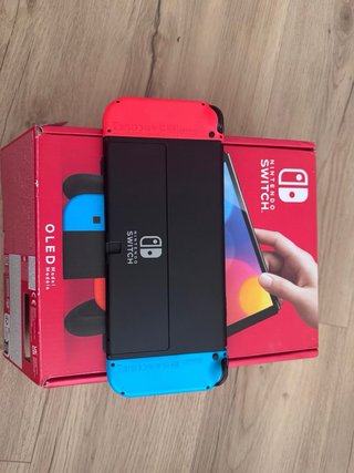 Nintendo Switch OLED Azul y Rojo
