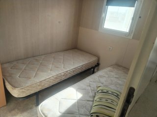 Mobil home o casa móvil de ocasión . Dormitorio de