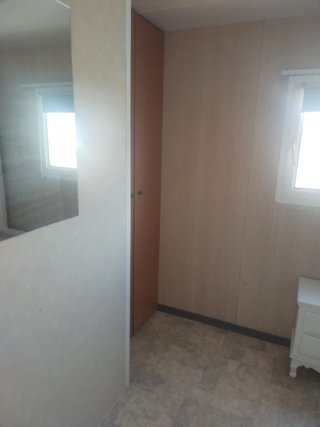 Mobil home o casa móvil de ocasión . Dormitorio de