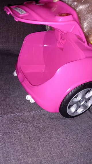 Muñeca Nancy en Coche Rosa con Patines
