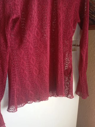 Blusa de manga larga con cuello alto