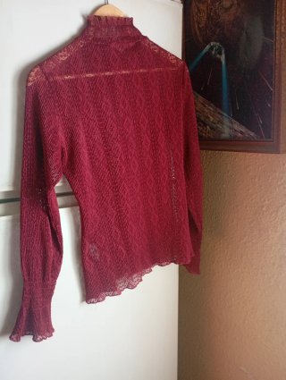 Blusa de manga larga con cuello alto