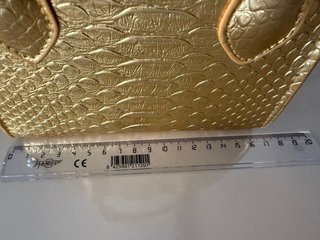 Mini bolso dorado efecto piel
