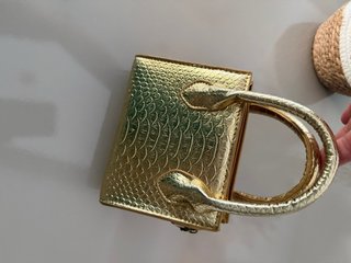Mini bolso dorado efecto piel