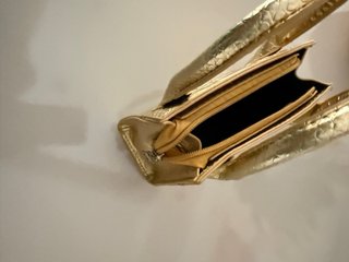 Mini bolso dorado efecto piel
