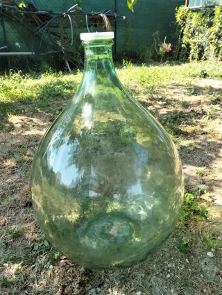 Damigiana in vetro verde