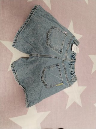 Pantalón vaquero niña desgastado