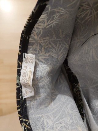 Mono corto negro estampado bambú