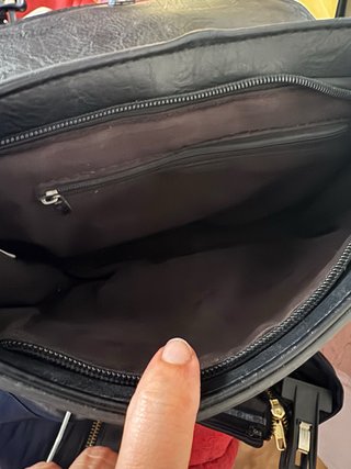 Abito nero elegante con borsa