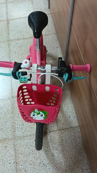 Bicicleta infantil rosa casi nueva
