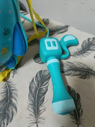 Mochila de agua dinosaurio