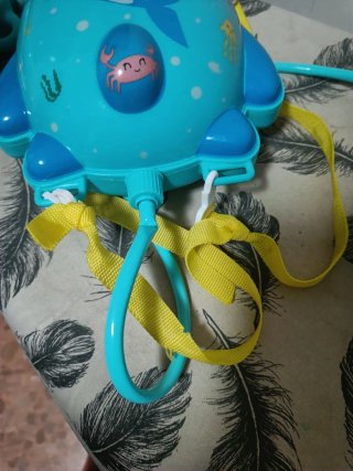 Mochila de agua dinosaurio