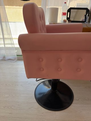 Sillón de peluquería rosa