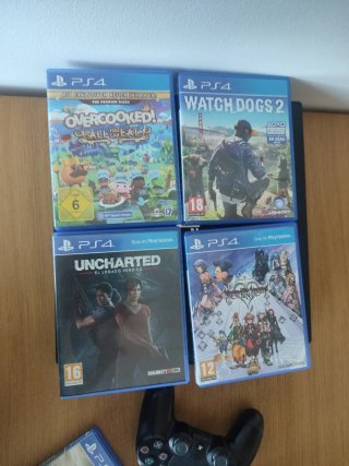 PS4 Pro 1TB + 1 mando+6 Juegos + 2 Micrófonos