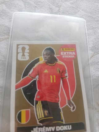 Carta Jérémy Doku Extra Sticker Dorada