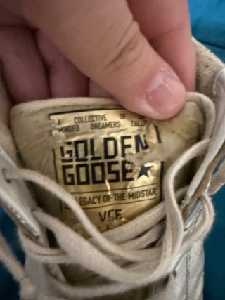 Golden Goose zapatillas doradas y blancas