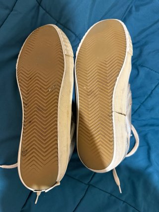 Golden Goose zapatillas doradas y blancas