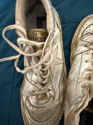 Golden Goose zapatillas doradas y blancas