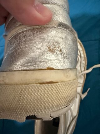 Golden Goose zapatillas doradas y blancas
