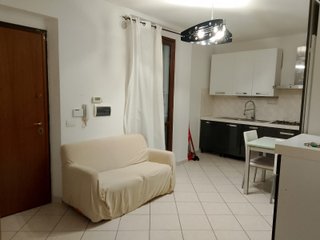 Divanetto 2 posti Arancione con copridivano Beige