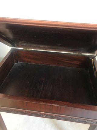 Piano stool. Doubles for side table. Glass top.
