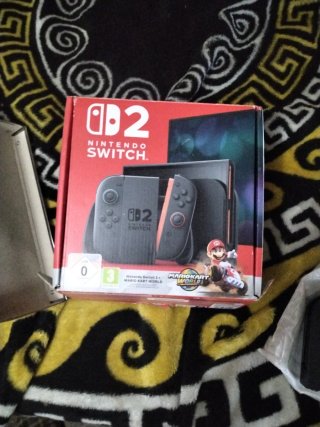 Nintendo Switch 2  , con Mario kart world, metroid