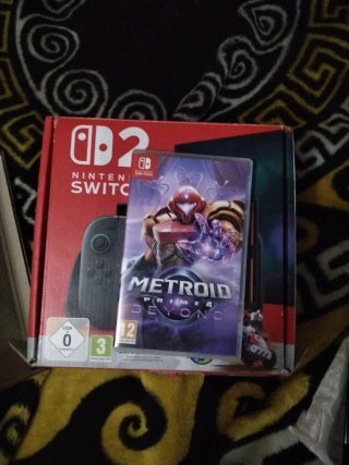 Nintendo Switch 2  , con Mario kart world, metroid